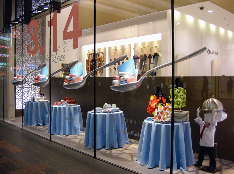 entice retail customers with interesting window displays